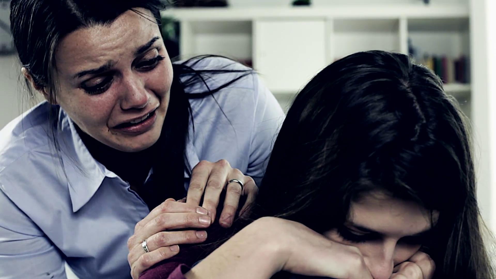 woman-crying-hugging-teenager-daughter_eemhpy51qg__F0010